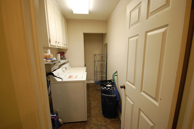 laundry room featuring cabinets and independent washer and dryer