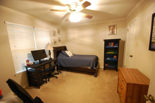 bedroom with crown molding, light colored carpet, and ceiling fan