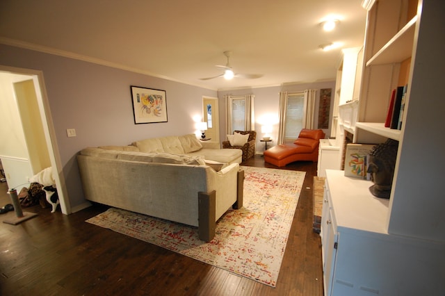 living room featuring ornamental molding, dark hardwood / wood-style floors, and ceiling fan