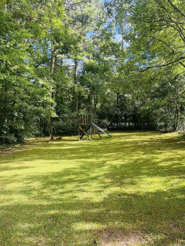 view of yard featuring a playground