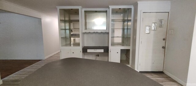 unfurnished room featuring hardwood / wood-style floors