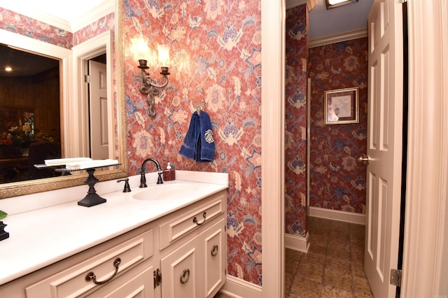 bathroom featuring vanity and ornamental molding