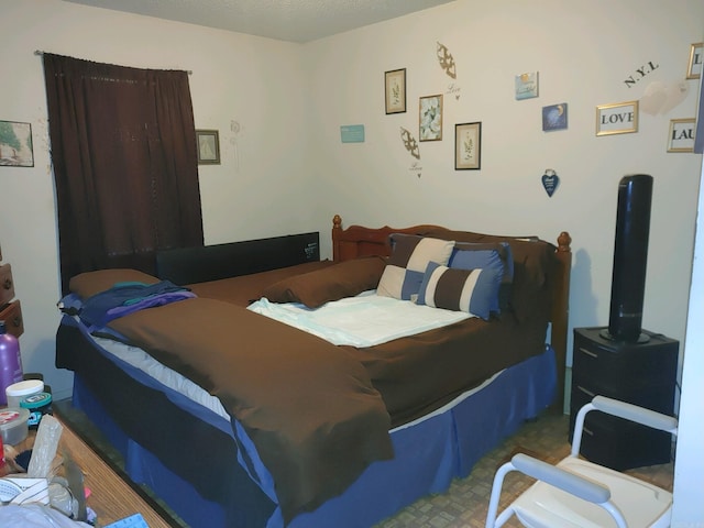 bedroom featuring dark carpet