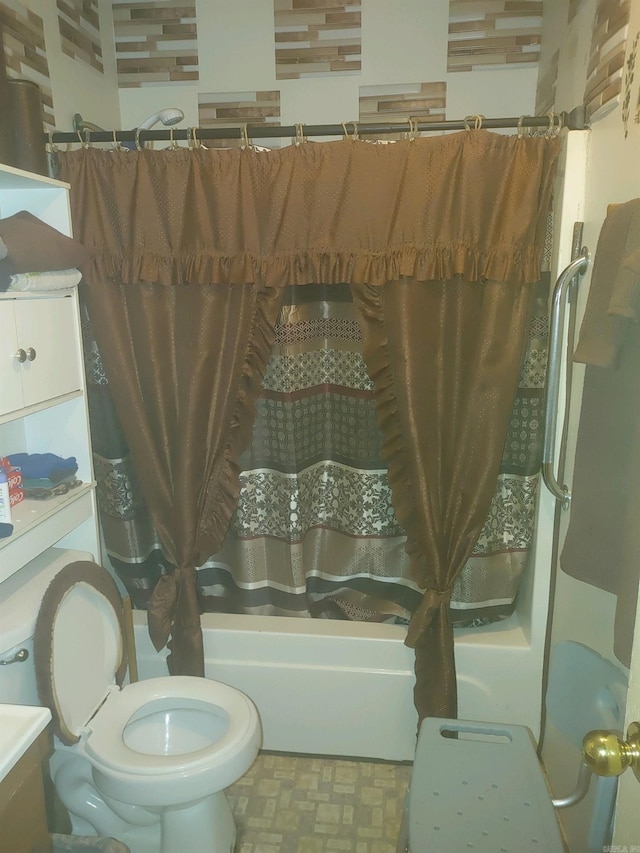 bathroom featuring shower / tub combo, tile patterned flooring, and toilet