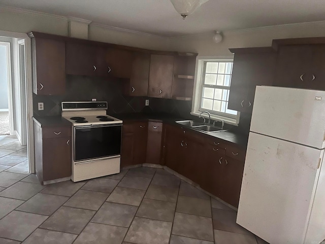 kitchen with decorative backsplash, white appliances, sink, dark brown cabinetry, and tile patterned flooring