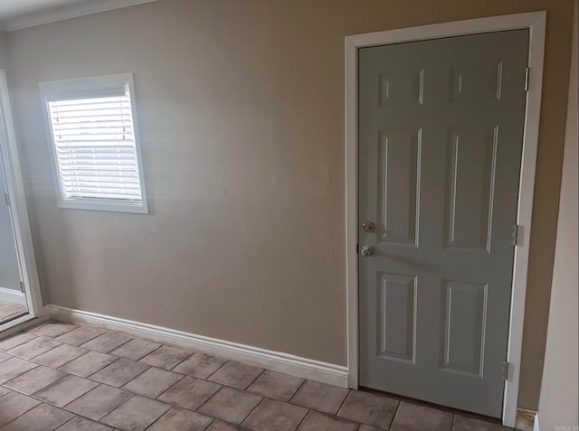 interior space with crown molding