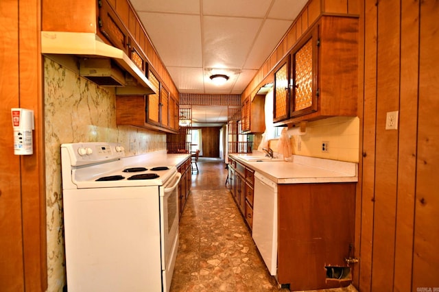 kitchen featuring sink and white appliances