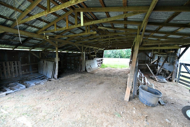 miscellaneous room with lofted ceiling