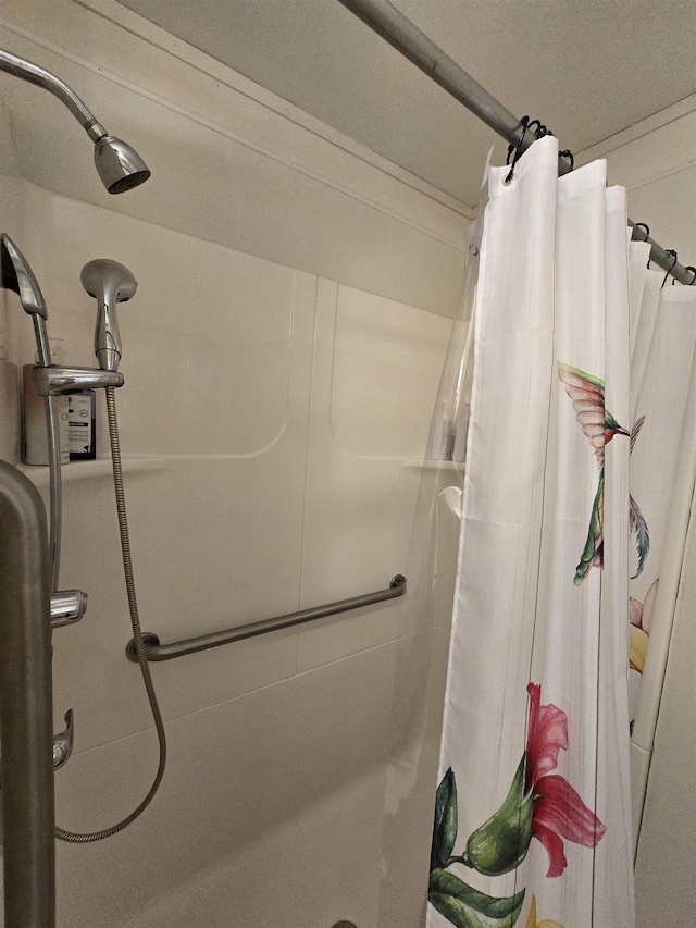 bathroom with a shower with curtain