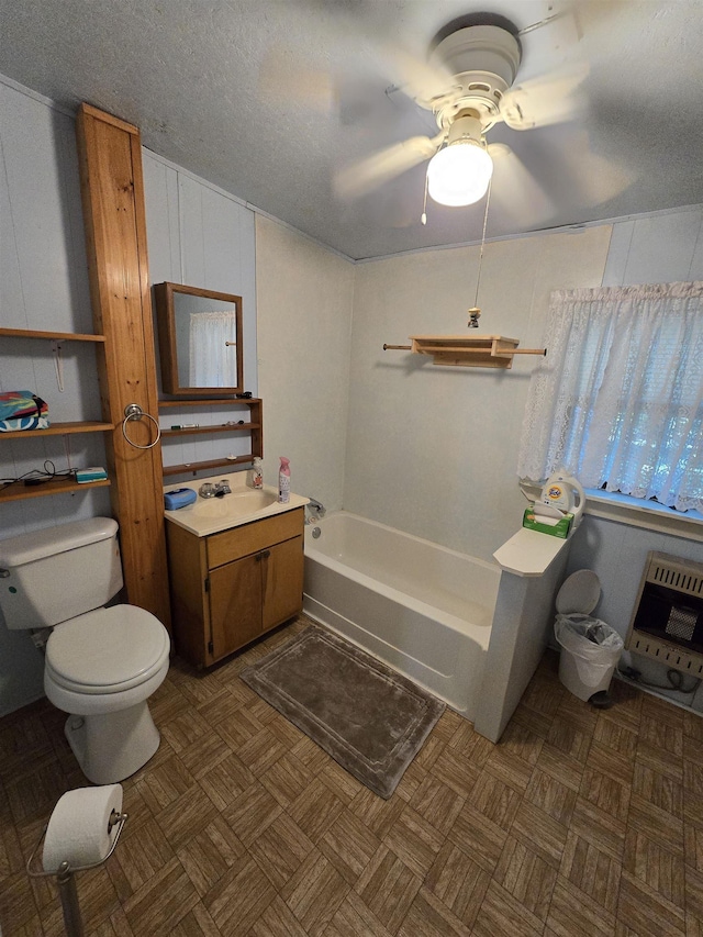 bathroom featuring heating unit, parquet floors, a bathtub, toilet, and a textured ceiling