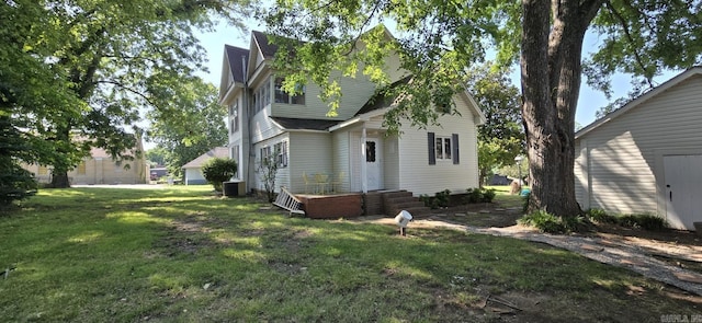 view of property exterior featuring a lawn