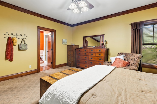 carpeted bedroom with connected bathroom and crown molding