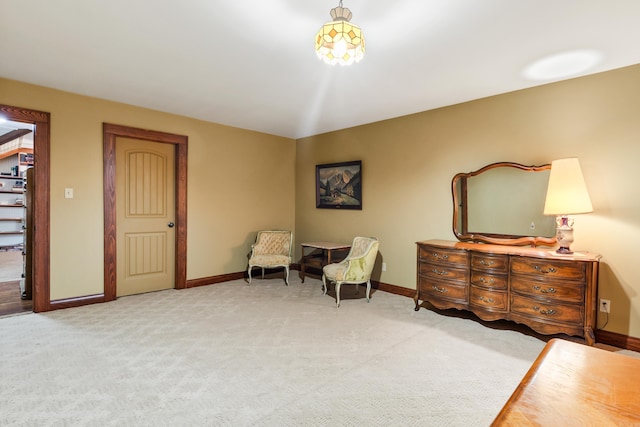 living area featuring light carpet