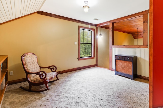 unfurnished room featuring carpet, wooden ceiling, vaulted ceiling, and crown molding