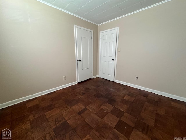 unfurnished room featuring ornamental molding