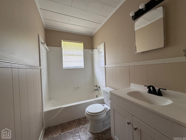 full bathroom featuring vanity, tiled shower / bath combo, toilet, and tile patterned flooring