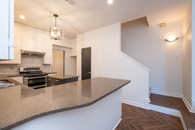 kitchen with stainless steel range with electric cooktop, white cabinetry, dark parquet floors, pendant lighting, and decorative backsplash