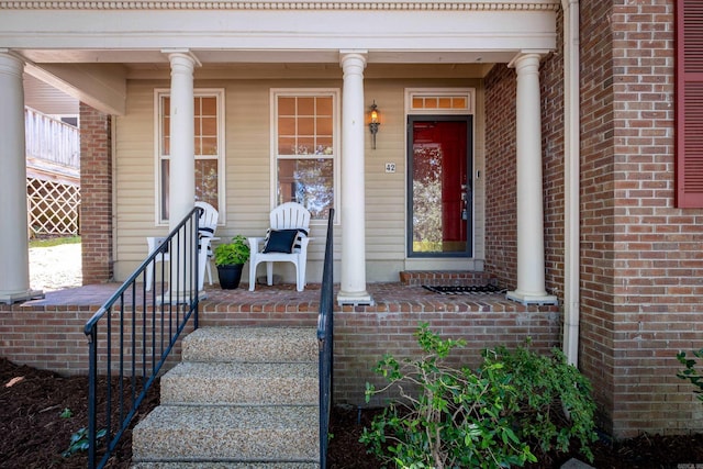 doorway to property with a porch