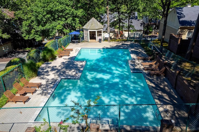 view of swimming pool with a gazebo and a patio