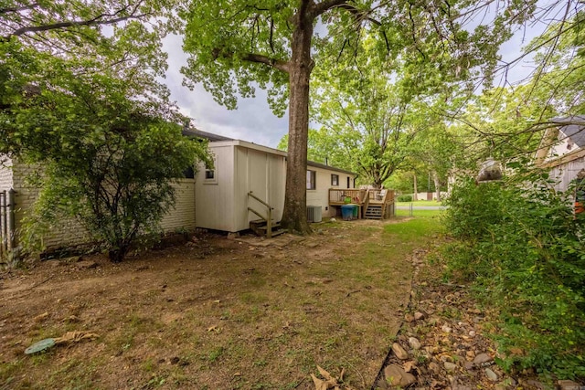 view of yard featuring a deck