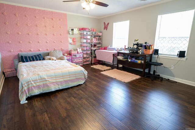 bedroom with dark wood-type flooring, ornamental molding, and ceiling fan