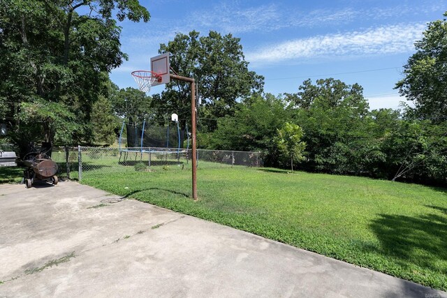 view of yard featuring a trampoline