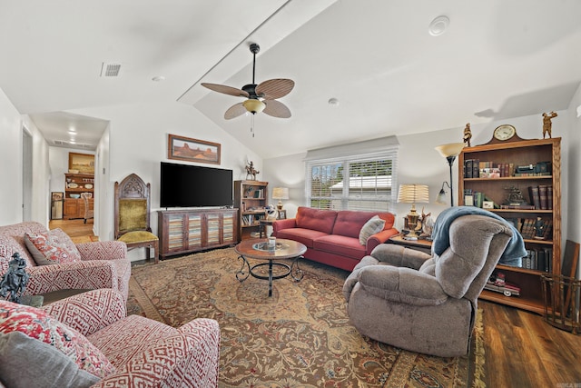 living room featuring vaulted ceiling, ceiling fan, and hardwood / wood-style floors