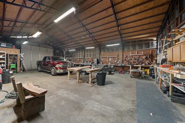 garage with a workshop area