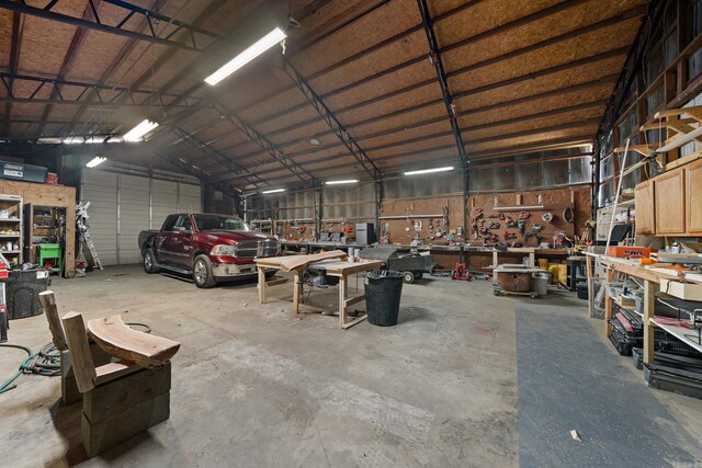 2911 Polk Rd 54, Mena, AR 71953 - garage featuring a workshop area