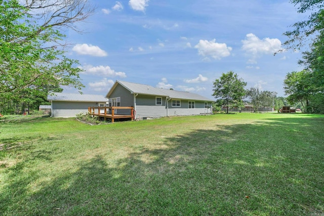 view of yard with a deck