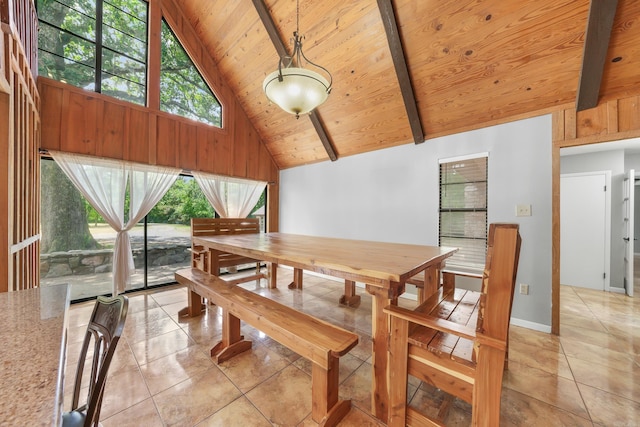 tiled dining area with beam ceiling, wood ceiling, and high vaulted ceiling