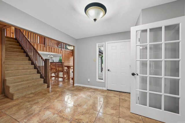 entrance foyer with light tile patterned floors