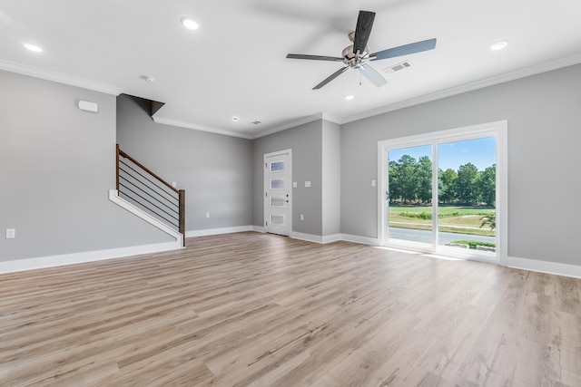 unfurnished living room with crown molding, ceiling fan, and light wood-type flooring