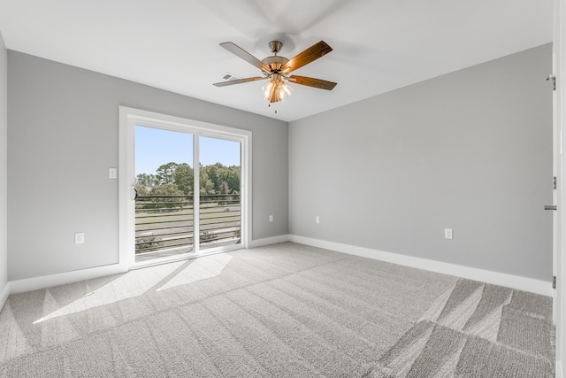 carpeted empty room with ceiling fan