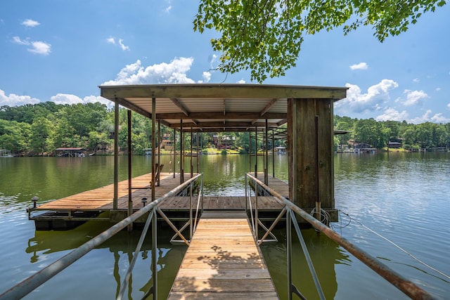 dock area with a water view