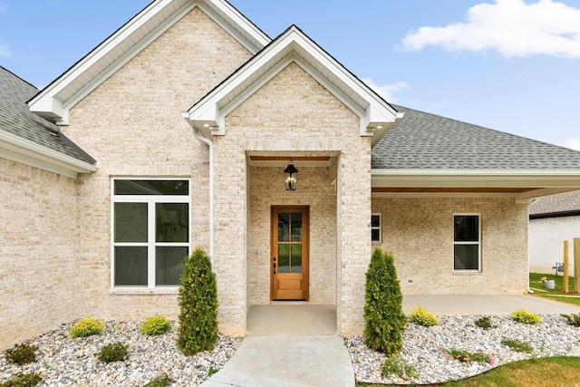 doorway to property with a patio