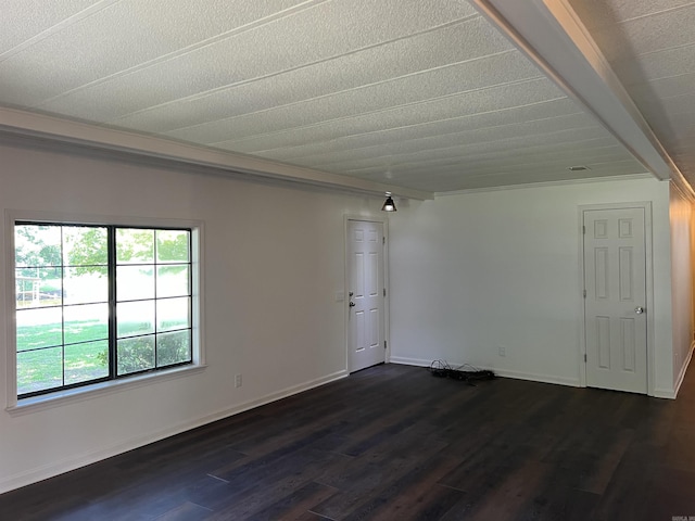 unfurnished room featuring dark hardwood / wood-style flooring