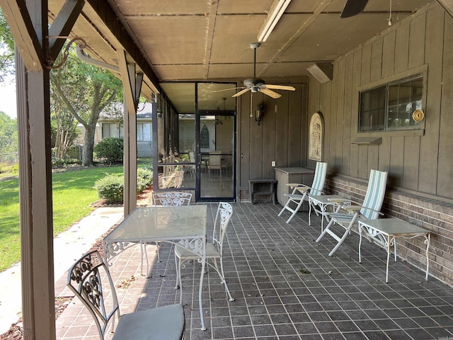 view of patio featuring ceiling fan