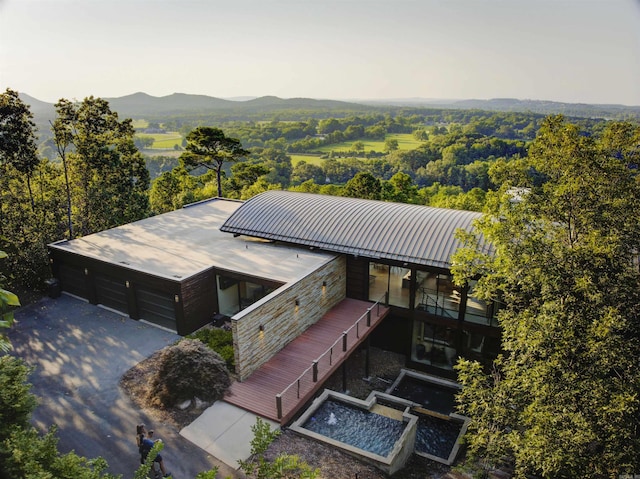 drone / aerial view featuring a mountain view