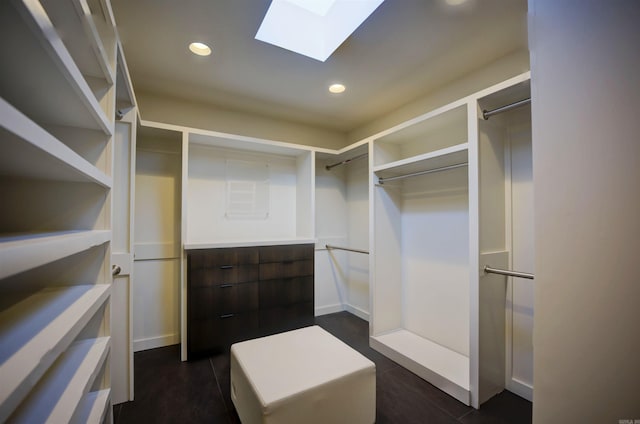 walk in closet with a skylight