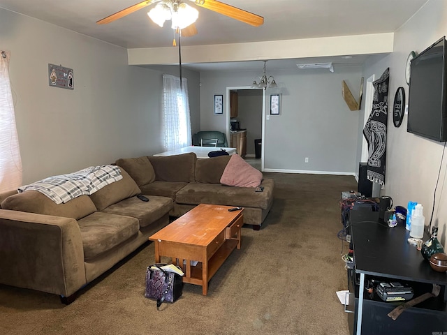 living room featuring ceiling fan and carpet