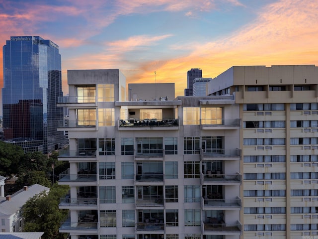 view of outdoor building at dusk