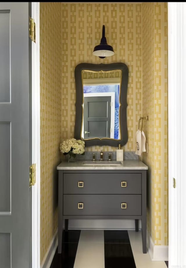 bathroom with vanity and tile patterned floors