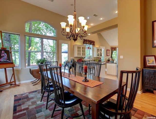 dining space with light wood-type flooring