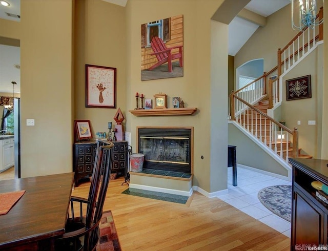 dining room featuring light hardwood / wood-style floors and a chandelier