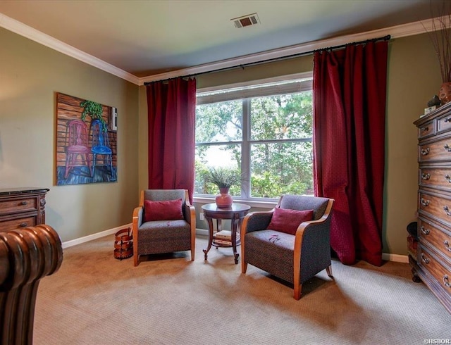 sitting room with light colored carpet and crown molding