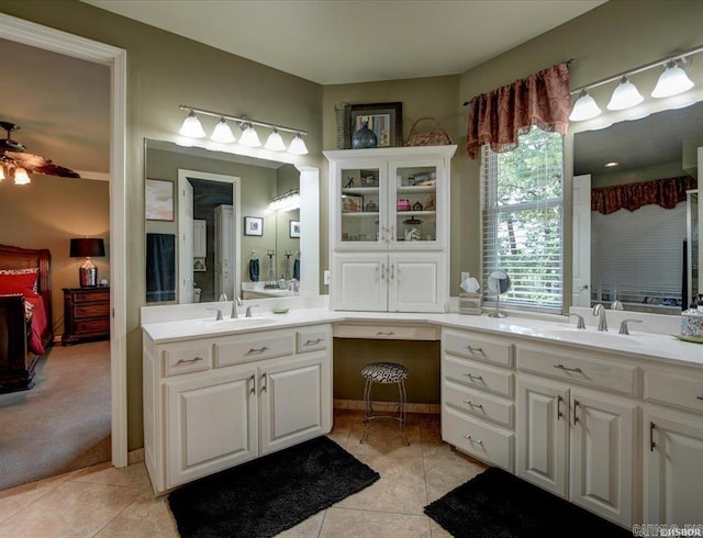 bathroom with tile patterned floors, ceiling fan, and vanity