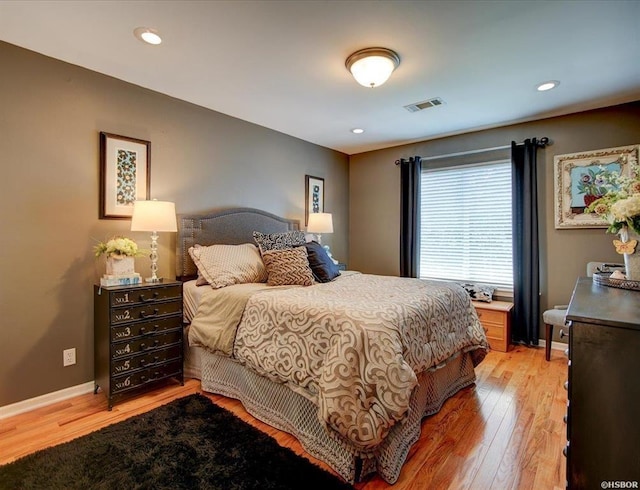 bedroom with light wood-type flooring