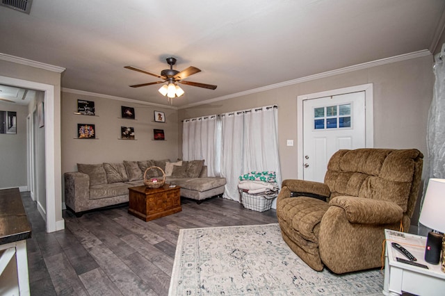 living room with ceiling fan, ornamental molding, and dark hardwood / wood-style floors