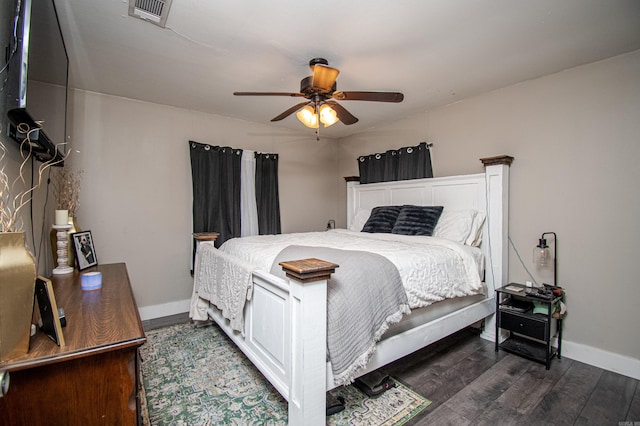 bedroom featuring dark wood-type flooring and ceiling fan